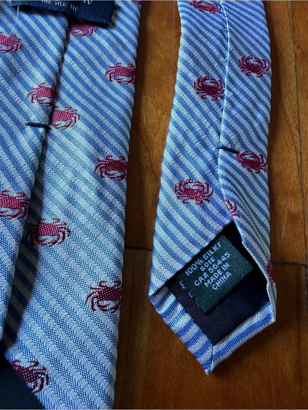J. Crew 100% silk blue and white thin tie with crabs design all over great style